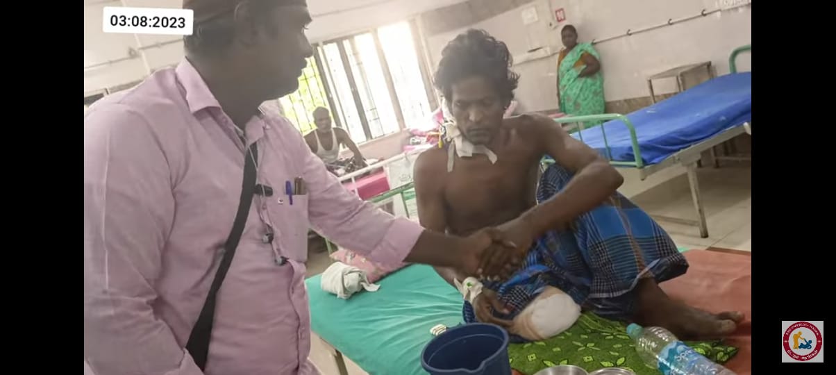 Volunteer checking on a patient at the hospital