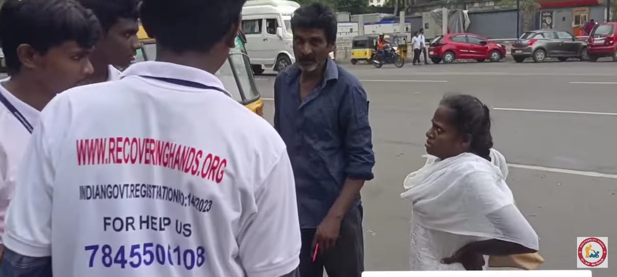 Volunteers verifying a street case in person